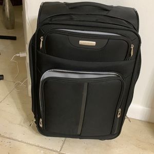 Black Samsonite carry on suitcase